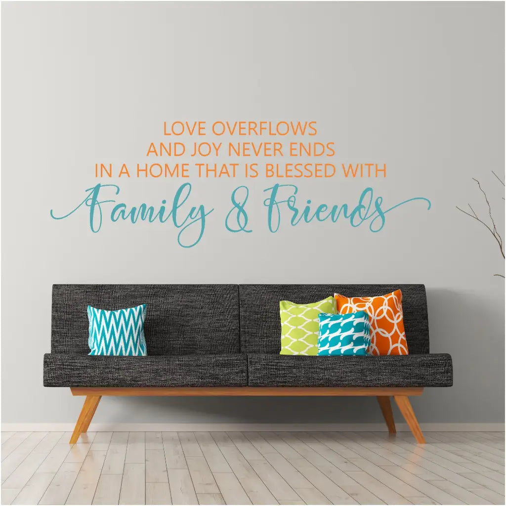 A beautiful vinyl wall quote decal by The Simple Stencil that reads: Love overflows and joy never ends in a home that is blessed with family & friends.