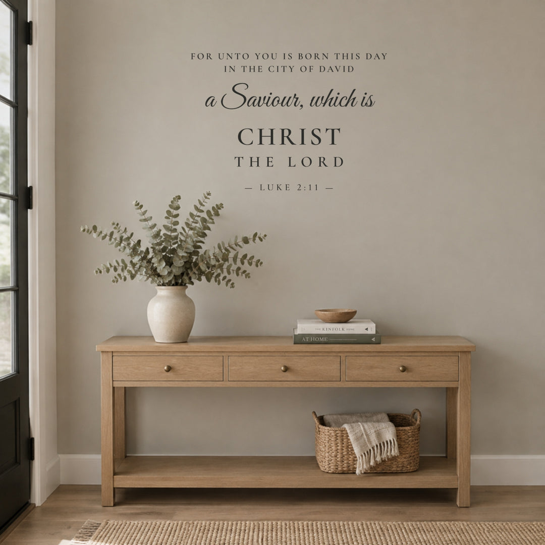 Luke 2:11 scripture wall decal without the star as year-round decor above an entryway console table