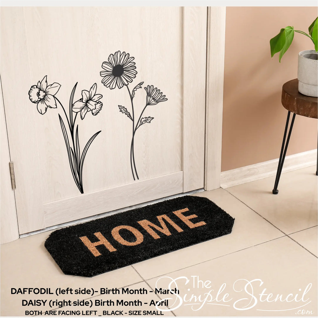 A combination of black Daffodil and Daisy wall graphics applied to a light wood entryway door to welcome guests.