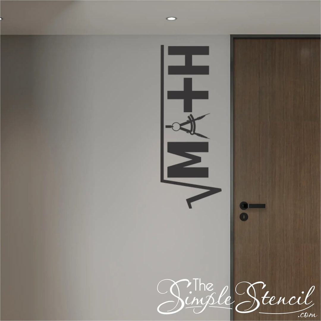 A vertical black vinyl math decal applied to a white wall next to a wooden classroom door. The creative design features the word "MATH" styled as a square root symbol, with a drafting compass forming the letter "A," making it ideal for school hallway or math department decoration.