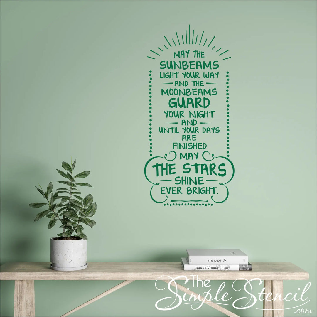 Traditional Irish proverb vinyl decal centered on a sage green wall above a wooden entryway bench, creating a welcoming and lucky atmosphere for the holiday.