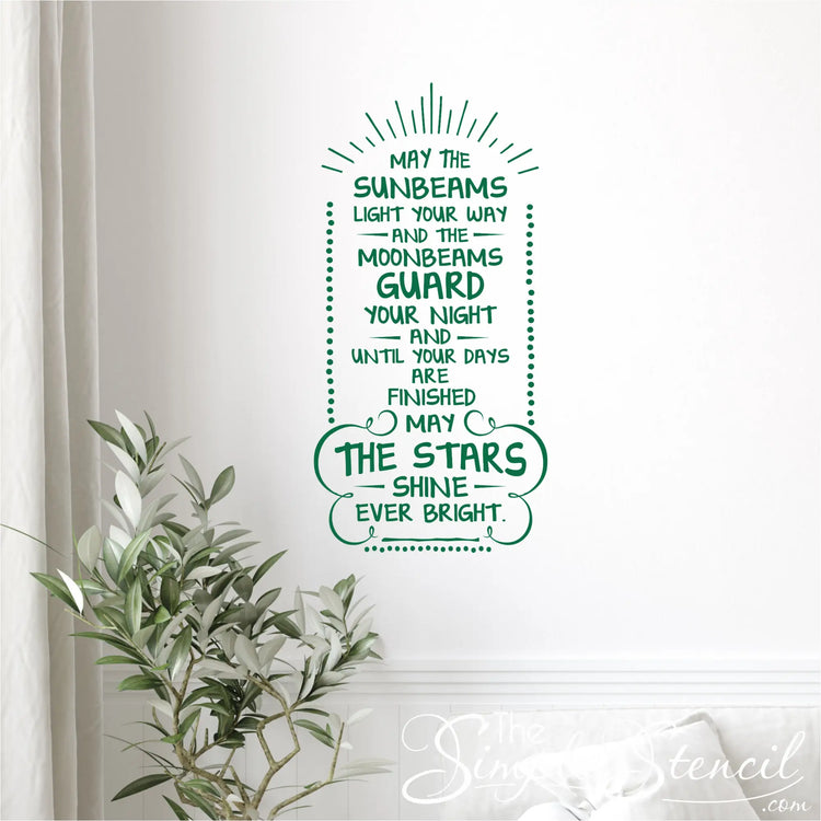 Vertical Irish blessing decal displayed on a bright white living room wall next to a houseplant, highlighting seasonal St. Patrick's Day wall decor ideas.