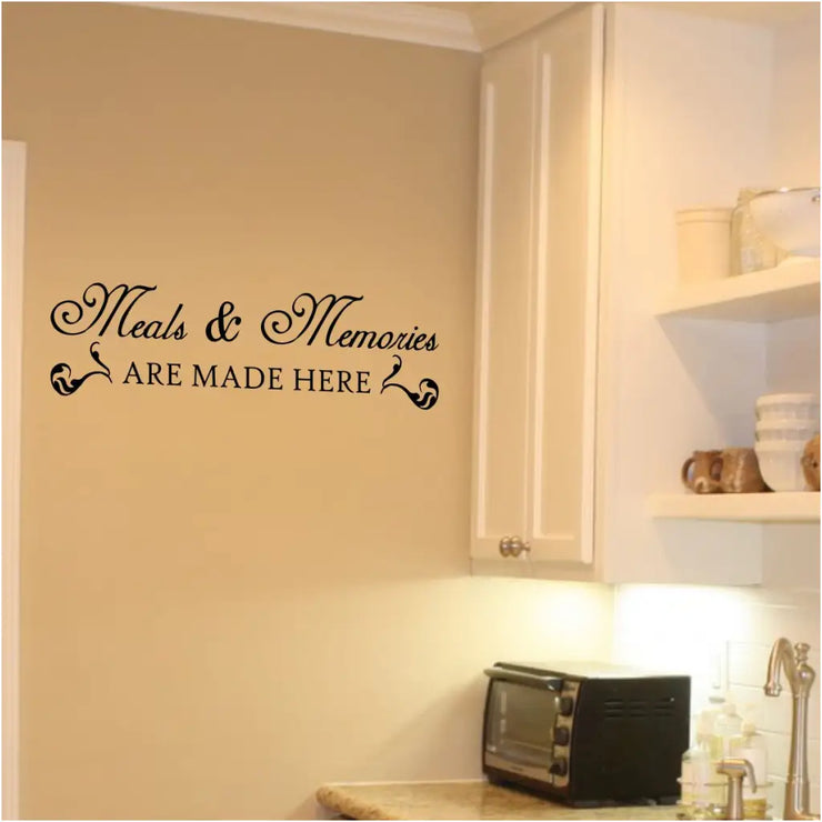 A popular wall decal by The Simple Stencil for the kitchen or pantry displayed on a kitchen wall reads: Meals and memories are made here.