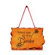 Meet me in the garden vinyl decal by The Simple Stencil applied to a wooden hanging sign to hang on door or anywhere you want to dress up your farmhouse decor.