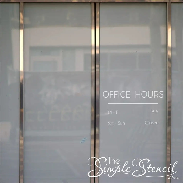 Minimalist "OFFICE HOURS" decal in white on a glass door with clean, sans-serif font.