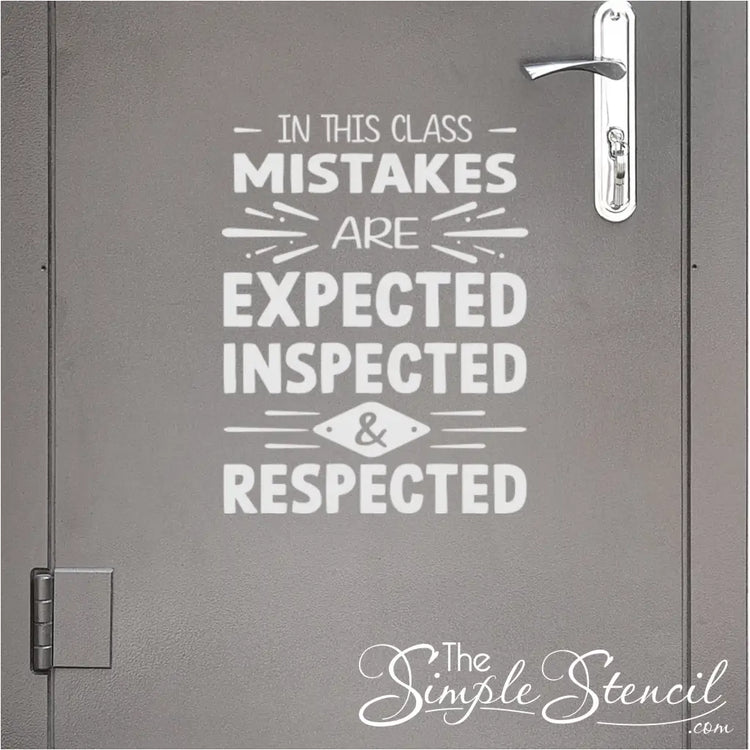 Inspirational classroom wall decal displayed on a school classroom door that reads: In this class, mistakes are expected, inspected and respected. By The Simple Stencil