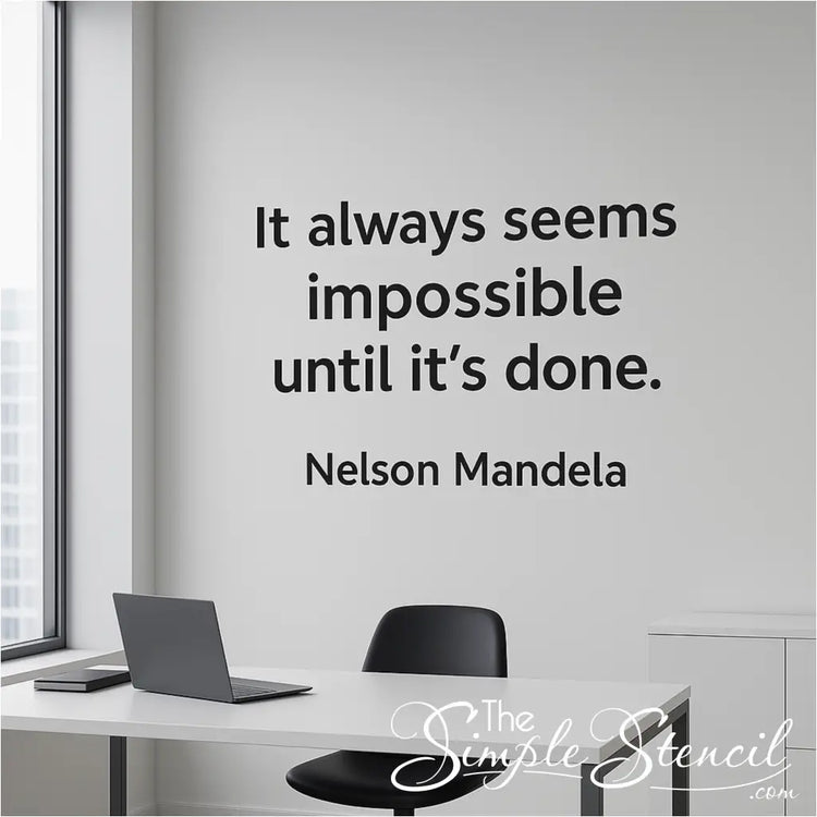 Nelson Mandela quote wall decal "It always seems impossible until it's done" in a modern black font on a light grey office wall.