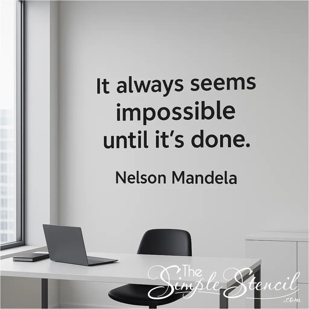 Nelson Mandela quote wall decal "It always seems impossible until it's done" in a modern black font on a light grey office wall.