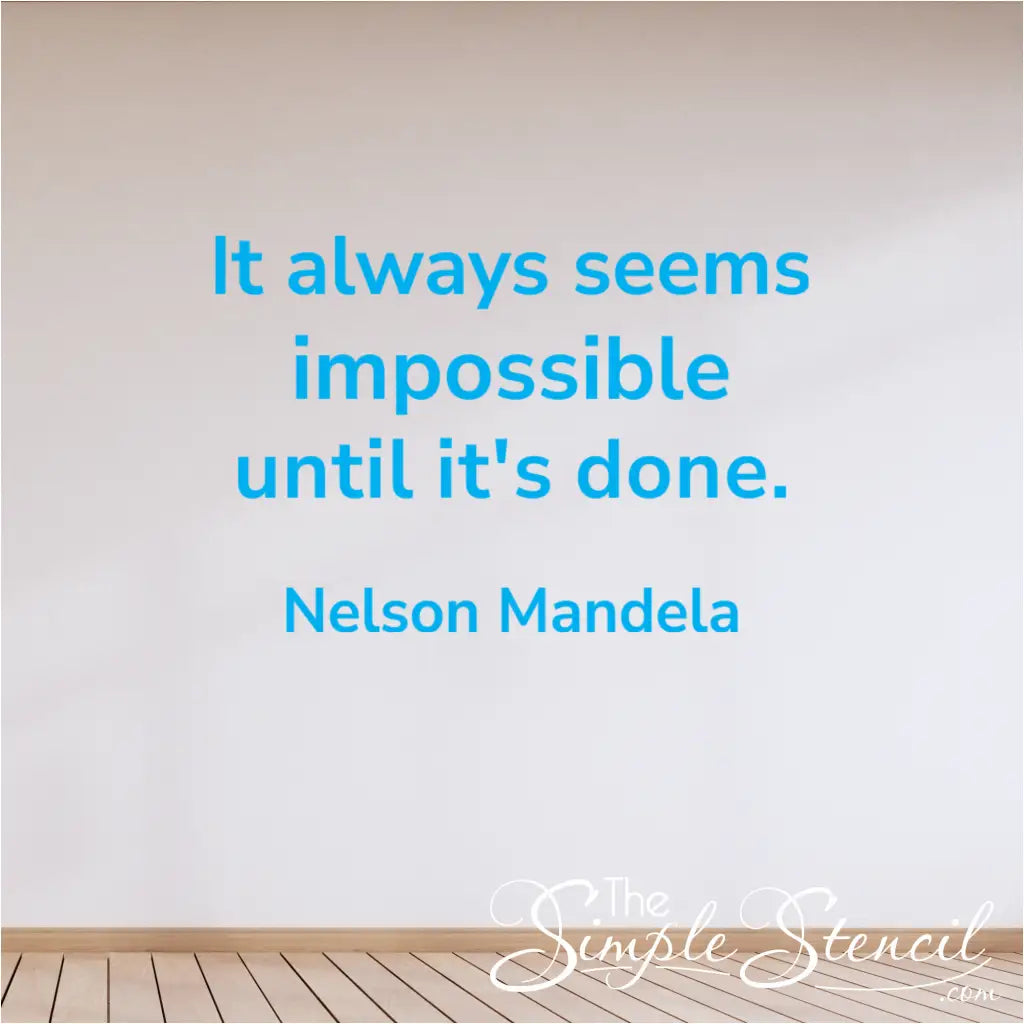 Large Nelson Mandela motivational vinyl decal "It always seems impossible until it's done" on a feature wall in a corporate meeting room or counselor's office, promoting resilience.