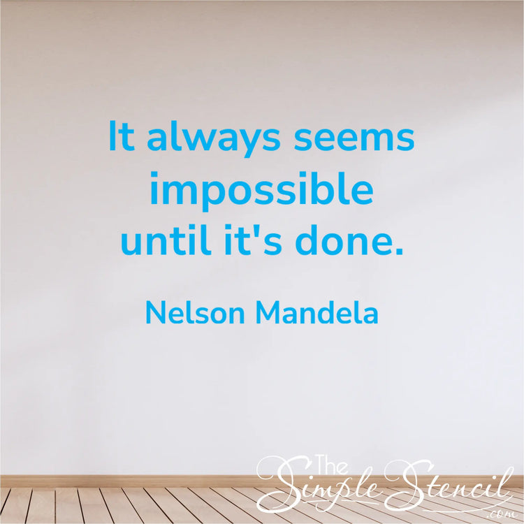 Large Nelson Mandela motivational vinyl decal "It always seems impossible until it's done" on a feature wall in a corporate meeting room or counselor's office, promoting resilience.