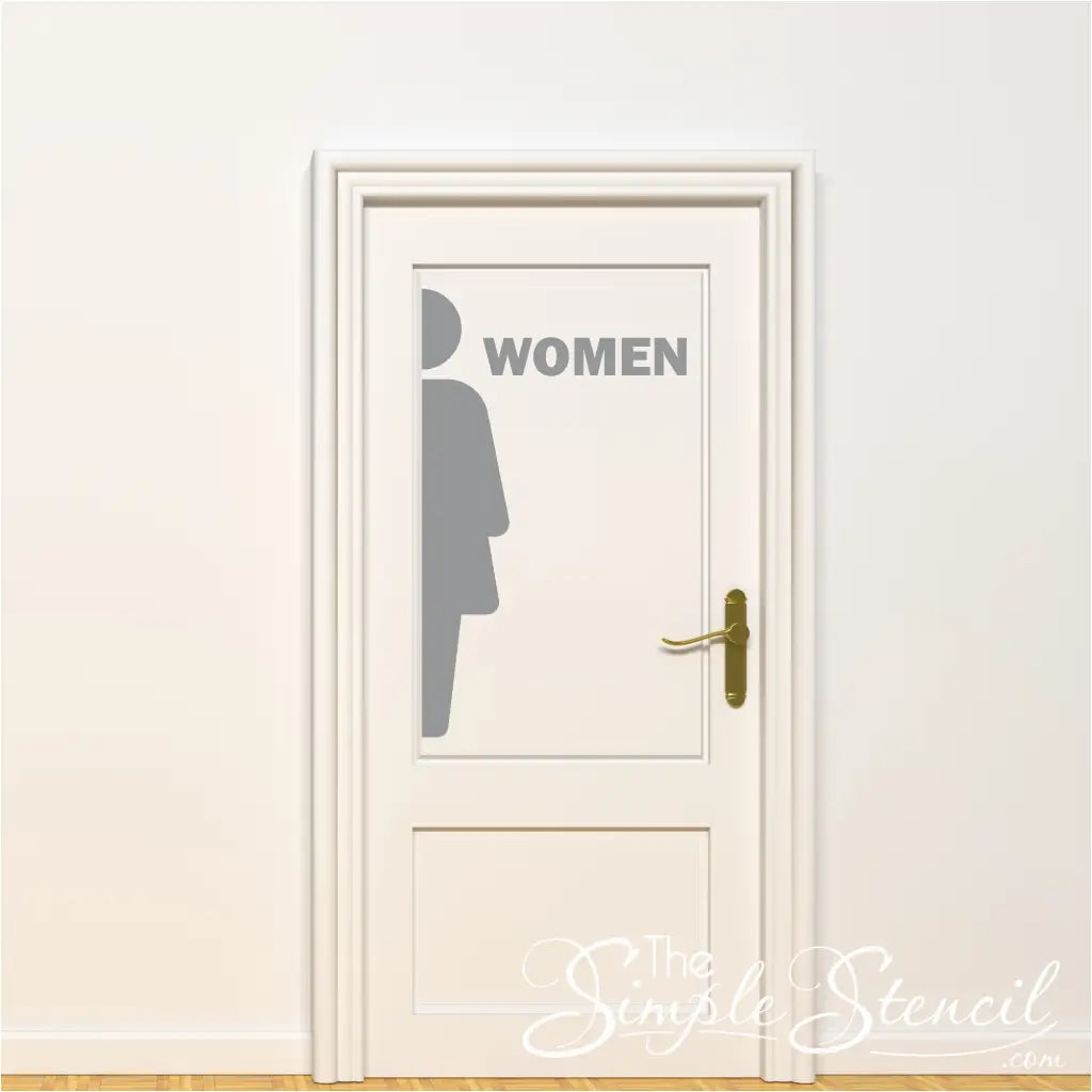 Elegant restroom door sign displaying a graceful female silhouette crafted from light grey vinyl adhesive for a subtle look.. The word "WOMEN" shown installed next to figure.