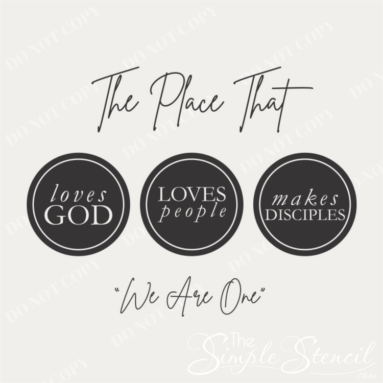 A close-up of a modern script wall decal  featuring the quote "The place that Loves God Loves People Makes Disciples 'We Are One'" in a sleek, elegant font.