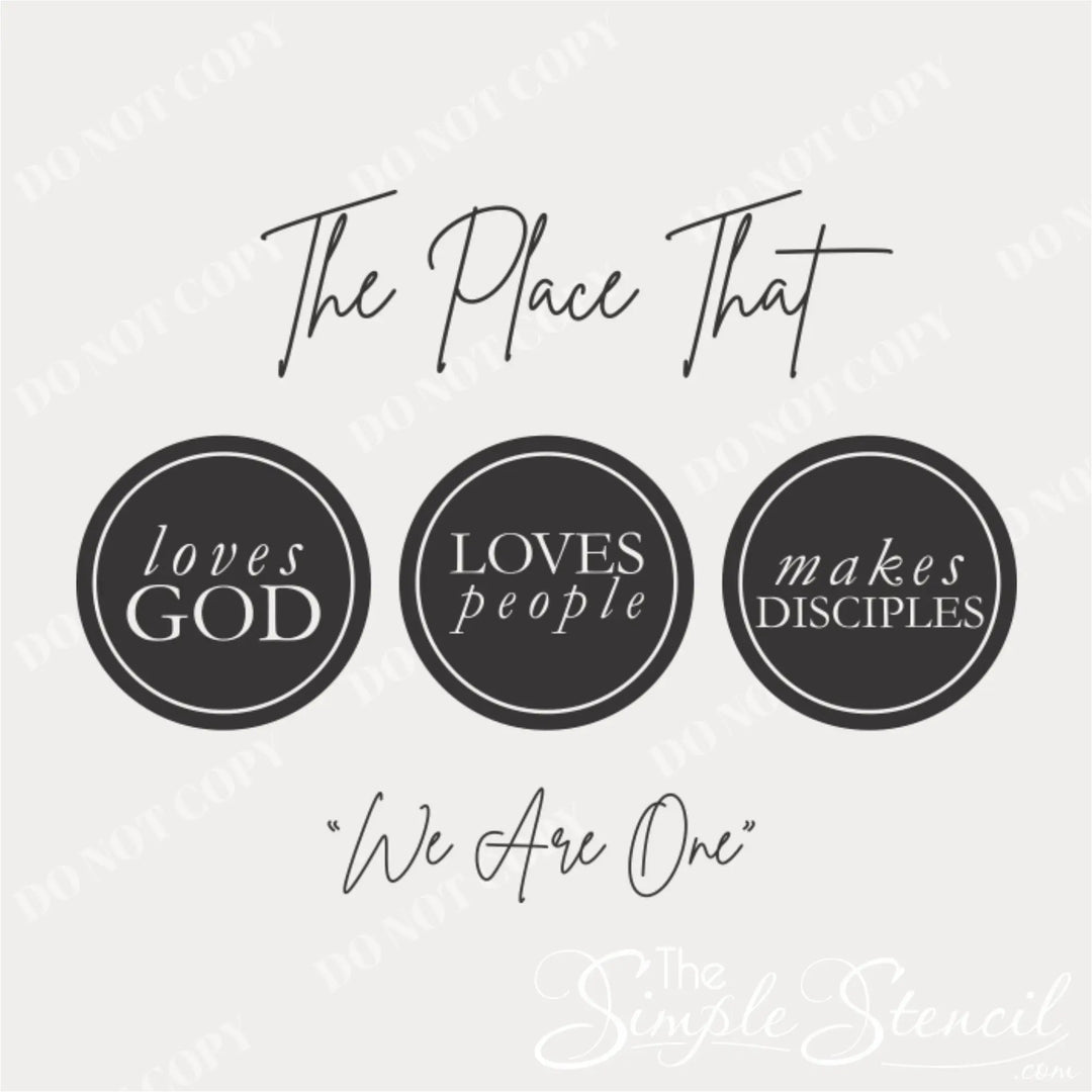 A close-up of a modern script wall decal  featuring the quote "The place that Loves God Loves People Makes Disciples 'We Are One'" in a sleek, elegant font.