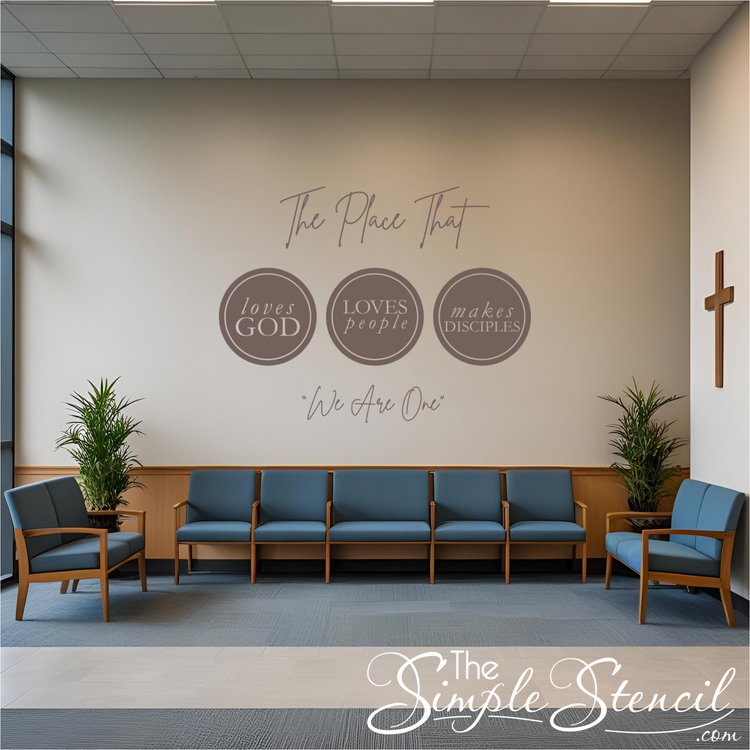 A welcoming church lobby enhanced by a large, impactful church wall decal reading "The place that loves God loves people Makes disciples We are one," a key element of the church wall decor.