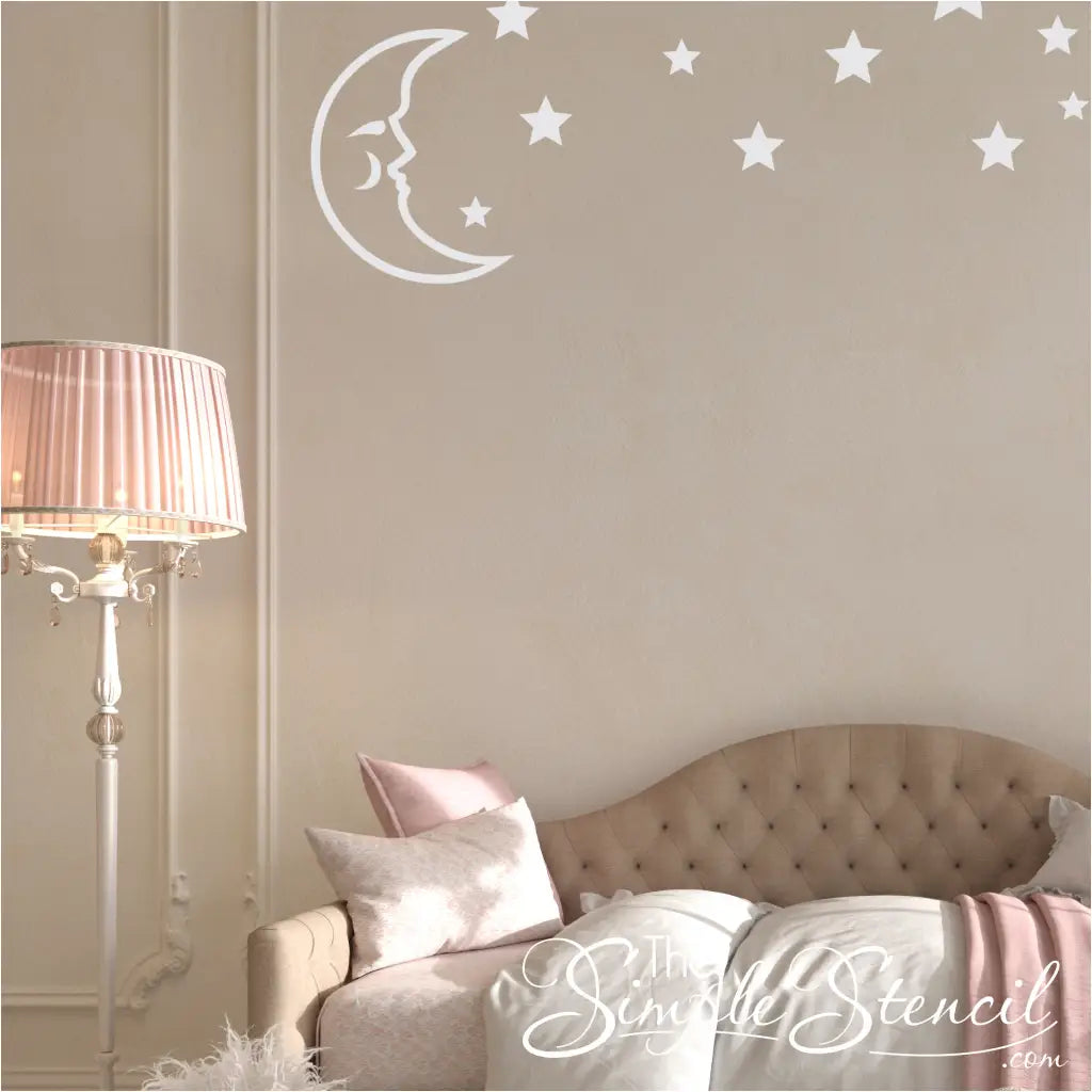 Moon and stars themed room decor with a sleepy moon decal