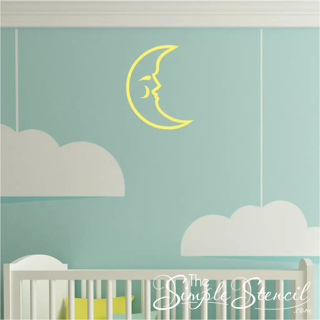 Cute sleepy crescent moon wall decal in a nursery