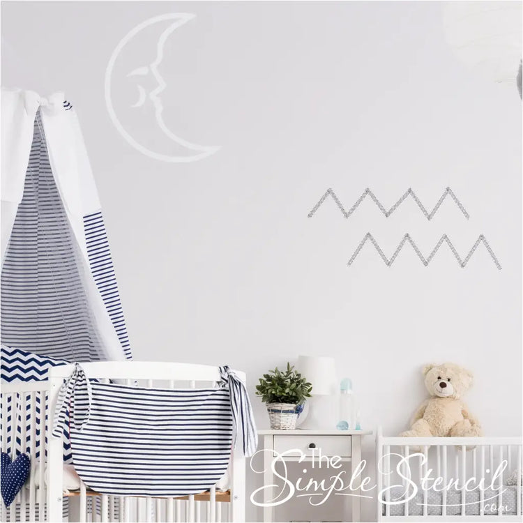 Sleepy moon sticker facing right on a child s bedroom wall
