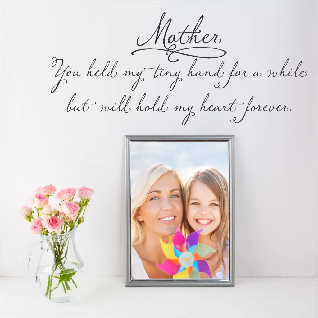 Mother - You held my tiny hand for a while, my heart forever