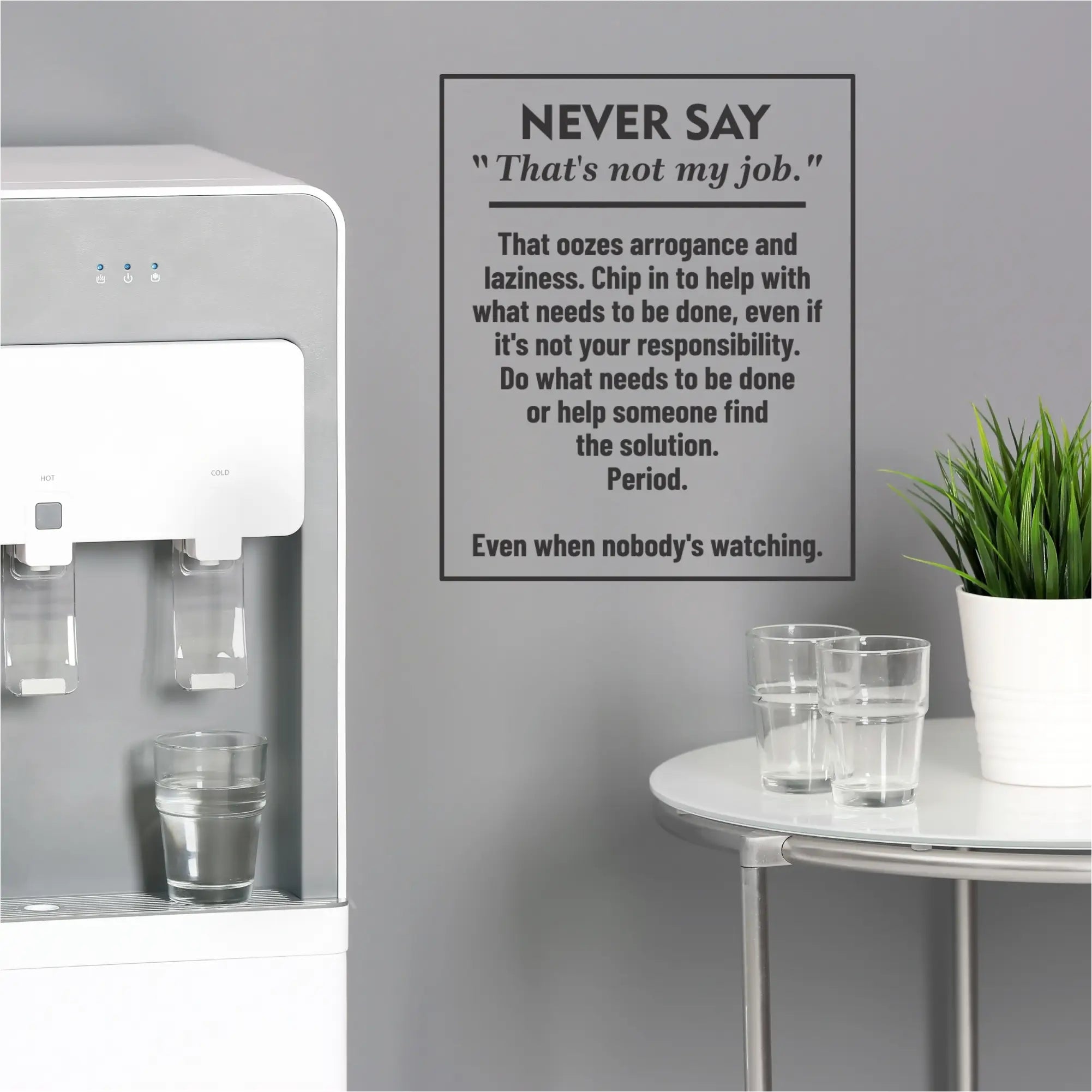 White water dispenser with two spouts and digital display promotes initiative and a strong classroom community decal