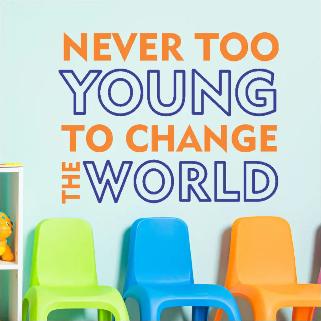 Close-up of a "Never Too Young to Change the World" wall decal in a bold easy to read font with two contrasting colors.