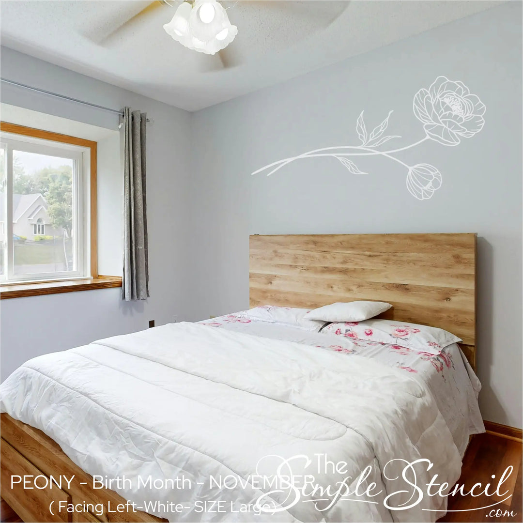 Large white Peony wall mural applied to a light grey bedroom wall, offering a soft, hand-painted look above a wooden headboard.