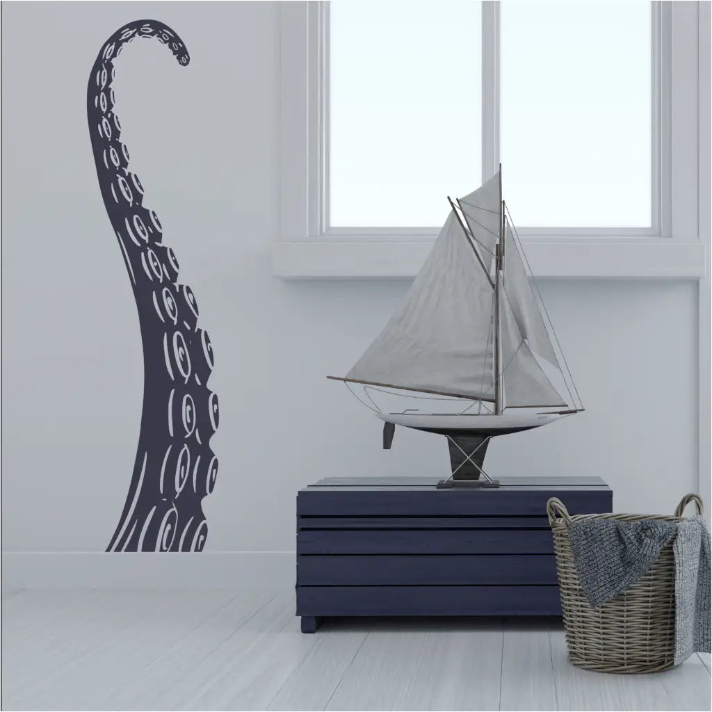 Large single octopus tentacle appearing as if it's rising into your room decor is a fun way to add decorative touch to your nautical themed room decor.