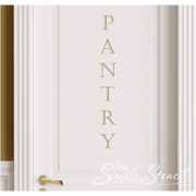 Close up of a pretty PANTRY door decal by The Simple Stencil showing the charming by simple lettering looks so elegant on a simple white door.