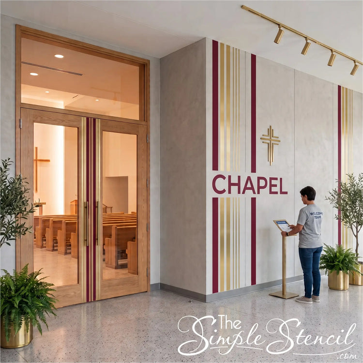 A person stands at a gold podium in a modern chapel lobby with wood double doors, a cream wall with vertical burgundy and gold stripes, and the word CHAPEL on the wall using Simple Stencil peel and stick vinyl decals and striping. 