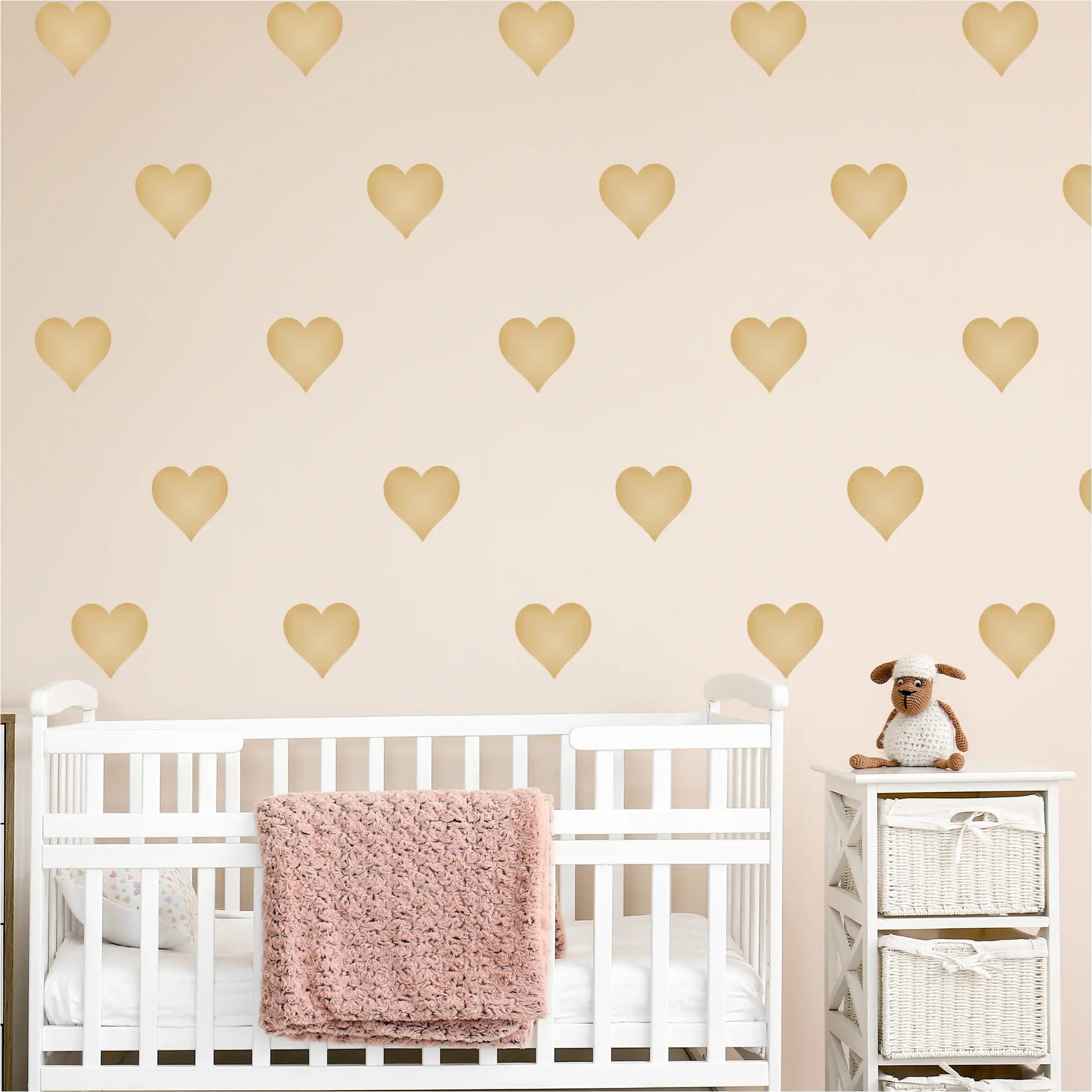 Easy Peel and Stick Heart Decals Displayed on  a Baby Nursery Wall by The Simple Stencil creates a nice focal point behind babies crib.