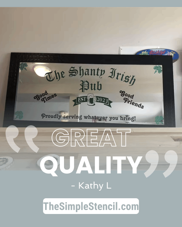 Black-framed mirrored pub sign with engraved the shanty irish pub text and decorative shamrocks for irish pub decor