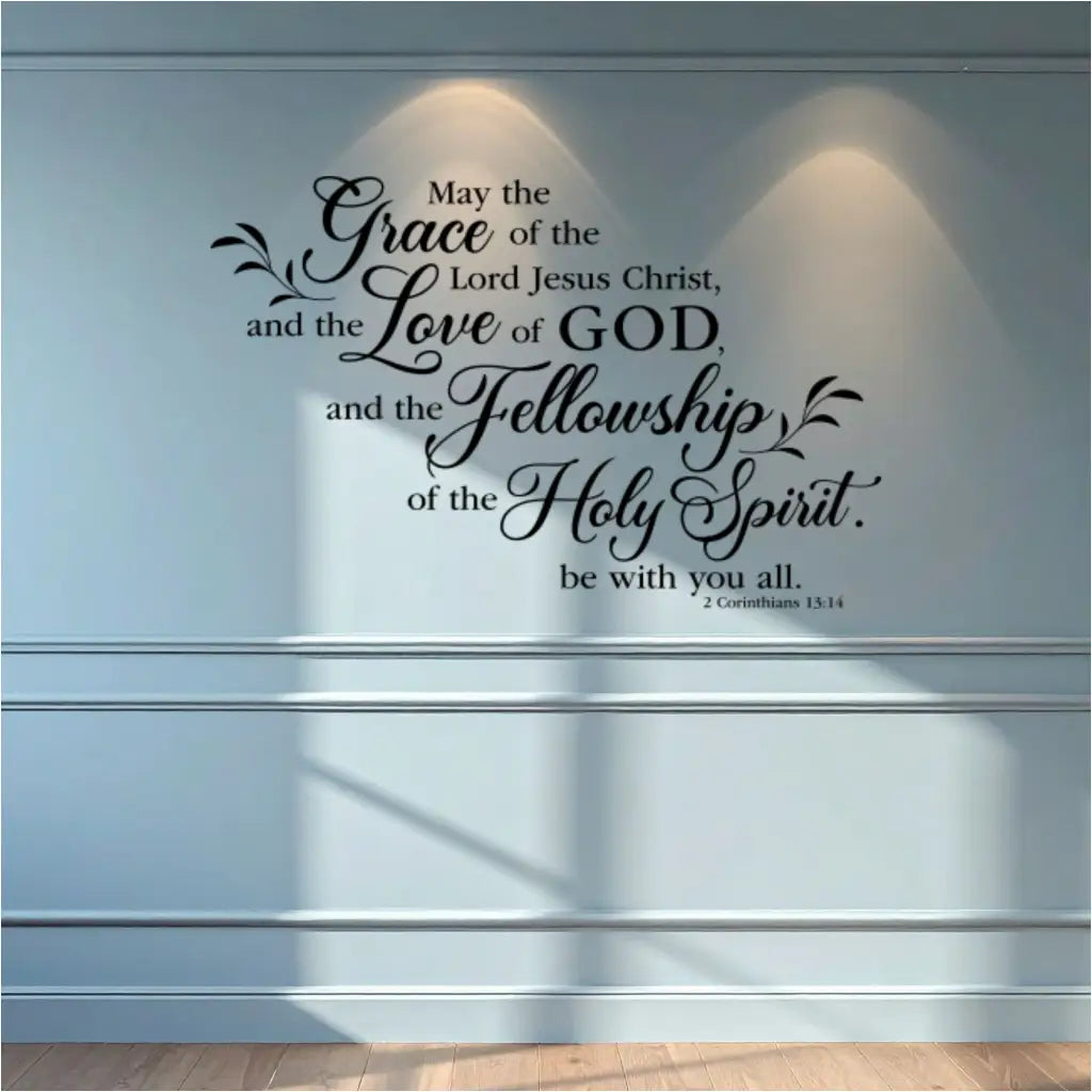 Black 2 Corinthians 13:14 decal centered on a light blue wall with wainscoting and spotlights, ideal for a formal chapel or sanctuary backdrop.