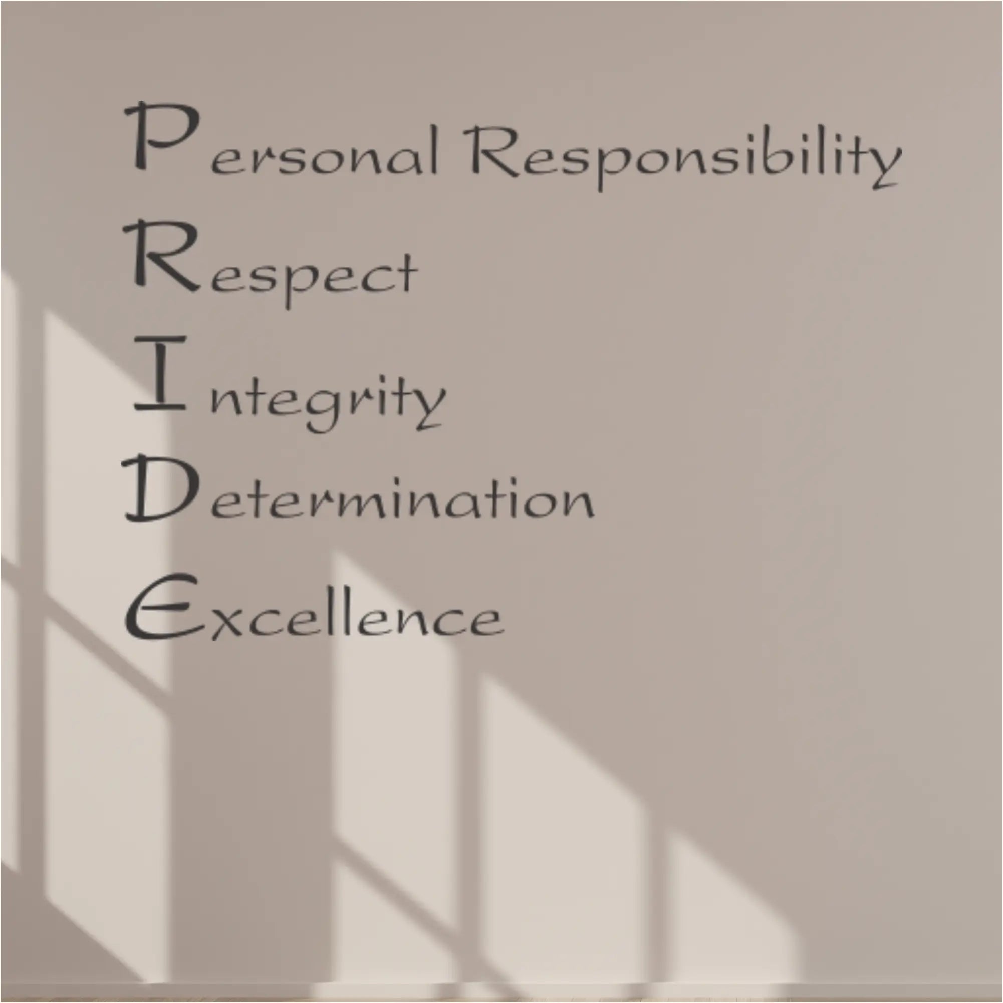 Motivational words on a wall with light and shadow patterns and PRIDE motivation
