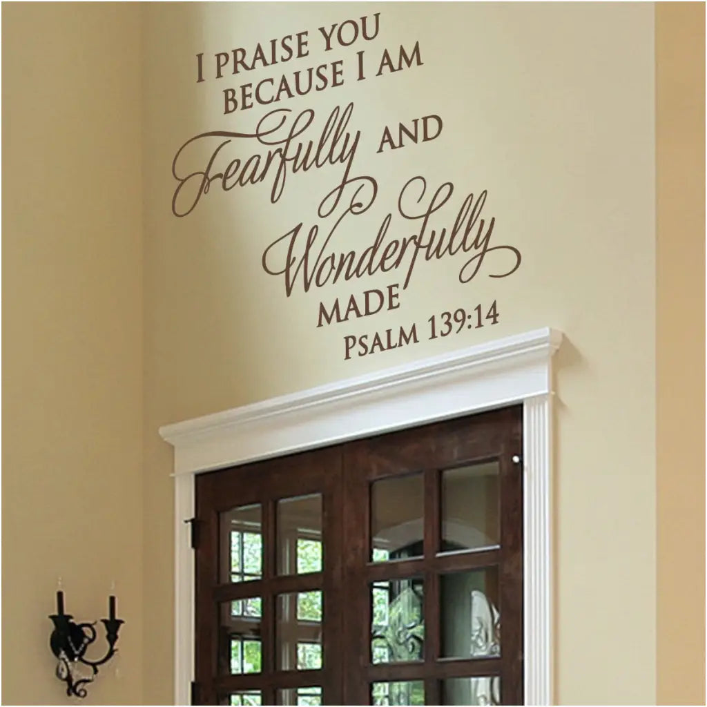 I praise you because I am fearfully and wonderfully made Psalm 139:14 bible verse wall art decal displayed over a church exit to share words of faith as congregation exits.