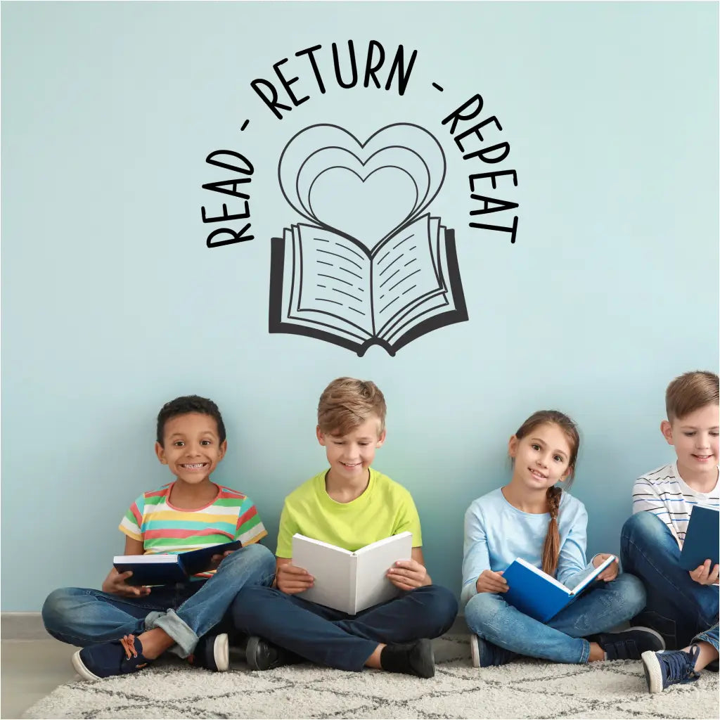 "Read Return Repeat" wall decal in black on a library wall, featuring an open book and heart graphics.
