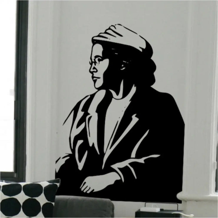 Rosa Parks Silhouette Wall Decal Sticker featuring Rosa Parks looking out the window wearing a hat.