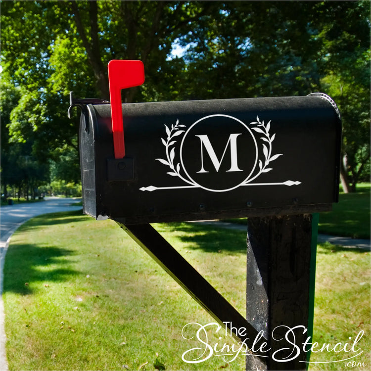 Black mailbox with a decorative 'M' rotunda monogram with family initial to dress up an ugly mailbox with style. 
