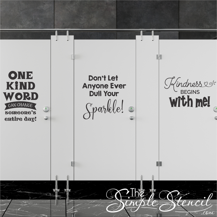 Colorful kindness quote decals on school bathroom stall doors with positive messages for students