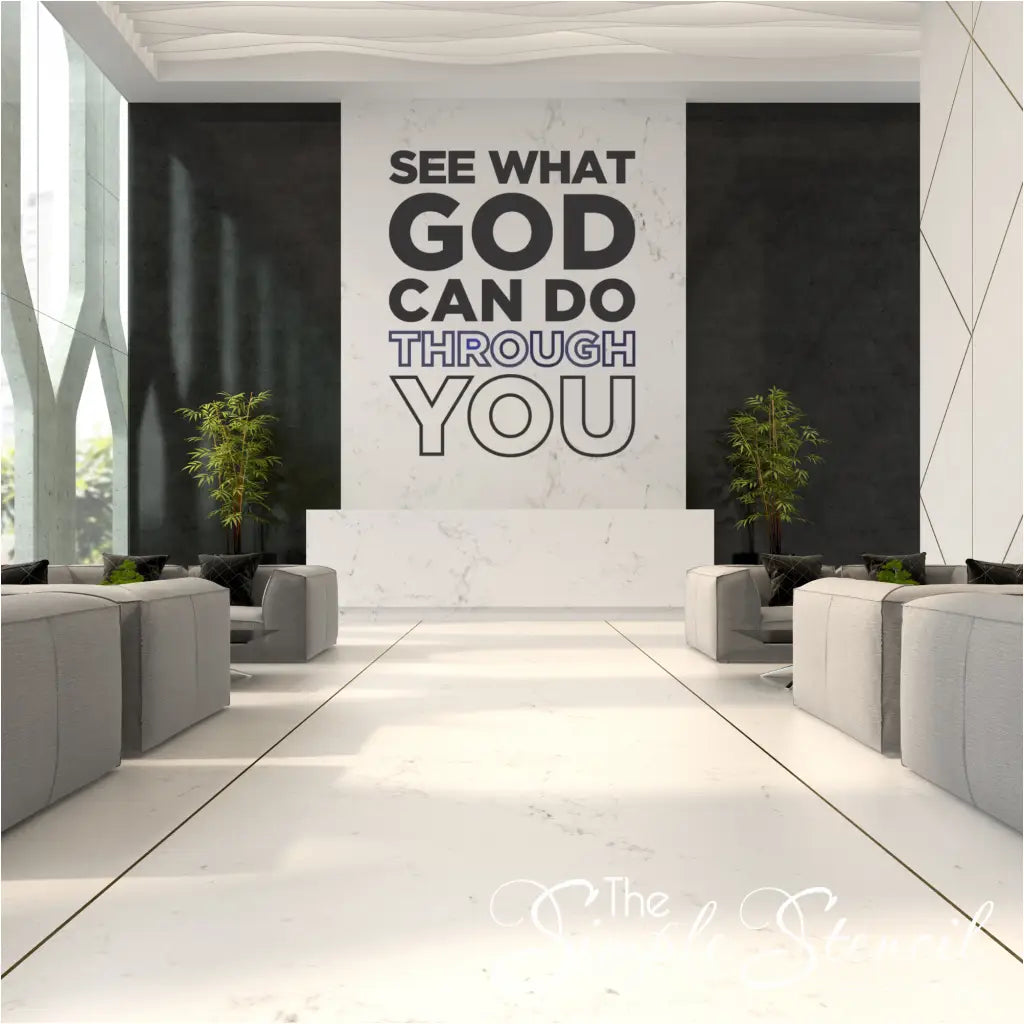 Large 'See What God Can Do Through You' vinyl wall lettering featured as a focal point in a modern, professional church lobby or office reception area with marble accents and indoor plants.