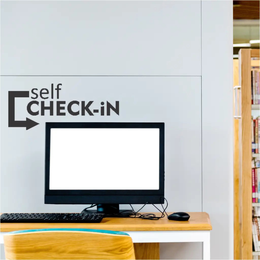 Black  vinyl decal with an arrow pointing right towards a library check-in computer station. Ideal for wayfinding signage in libraries. (The Simple Stencil)