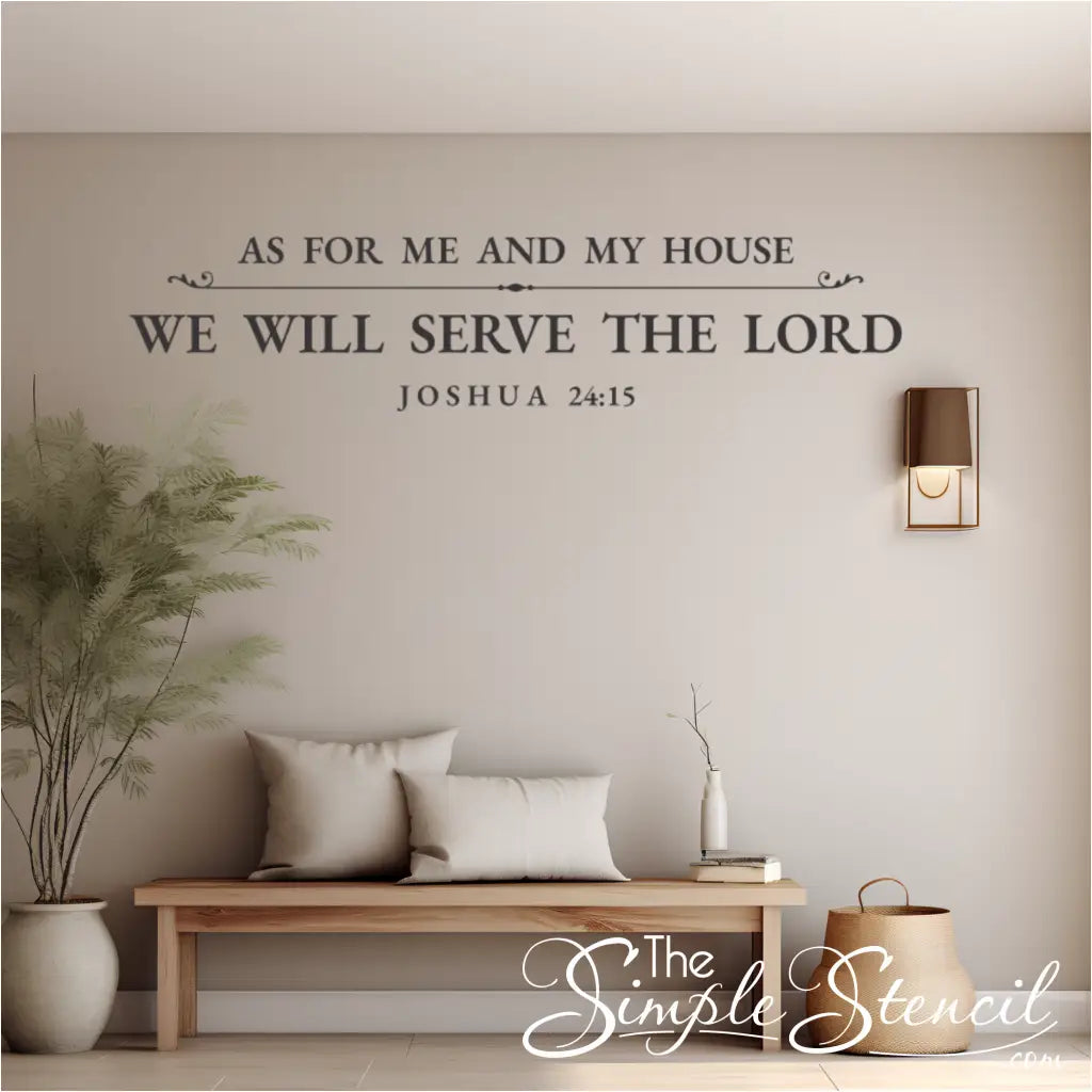 Dark grey religious wall decal of Joshua 24:15 above a light wood entryway bench with pillows, a woven basket, and a wall sconce.