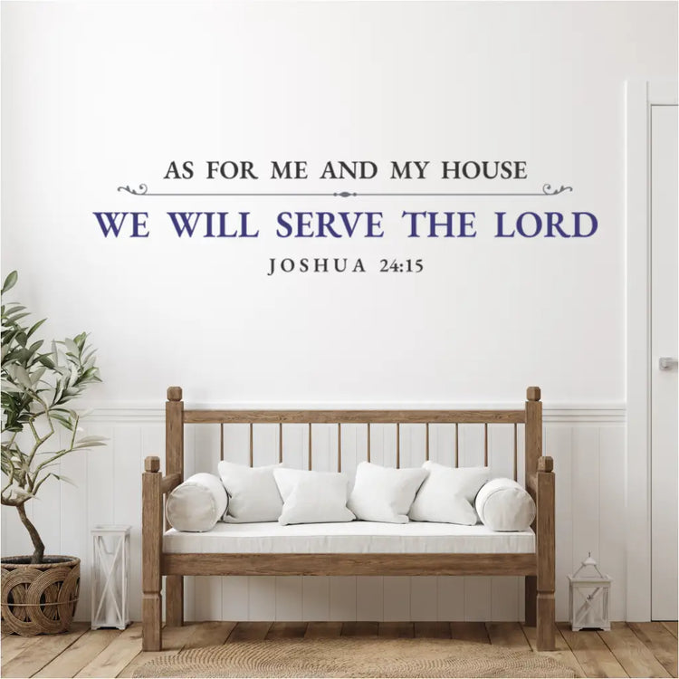 Dark blue Christian wall art decal, "As For Me and My House...", on a white shiplap wall above a rustic wooden bench with white pillows.