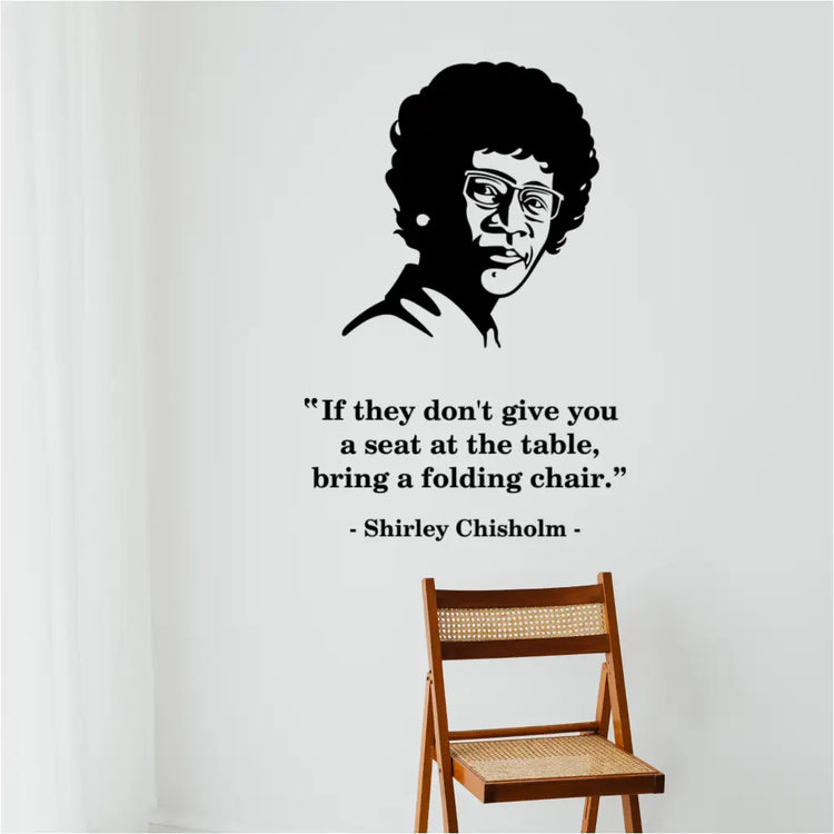 Shirley Chisholm silhouette portrait on a white wall above a wooden folding chair, illustrating her famous leadership quote.