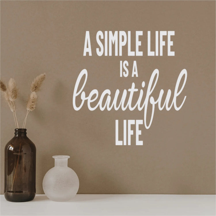 White removable wall decal quote with bold and cursive text easy application for a simple life is a beautiful life