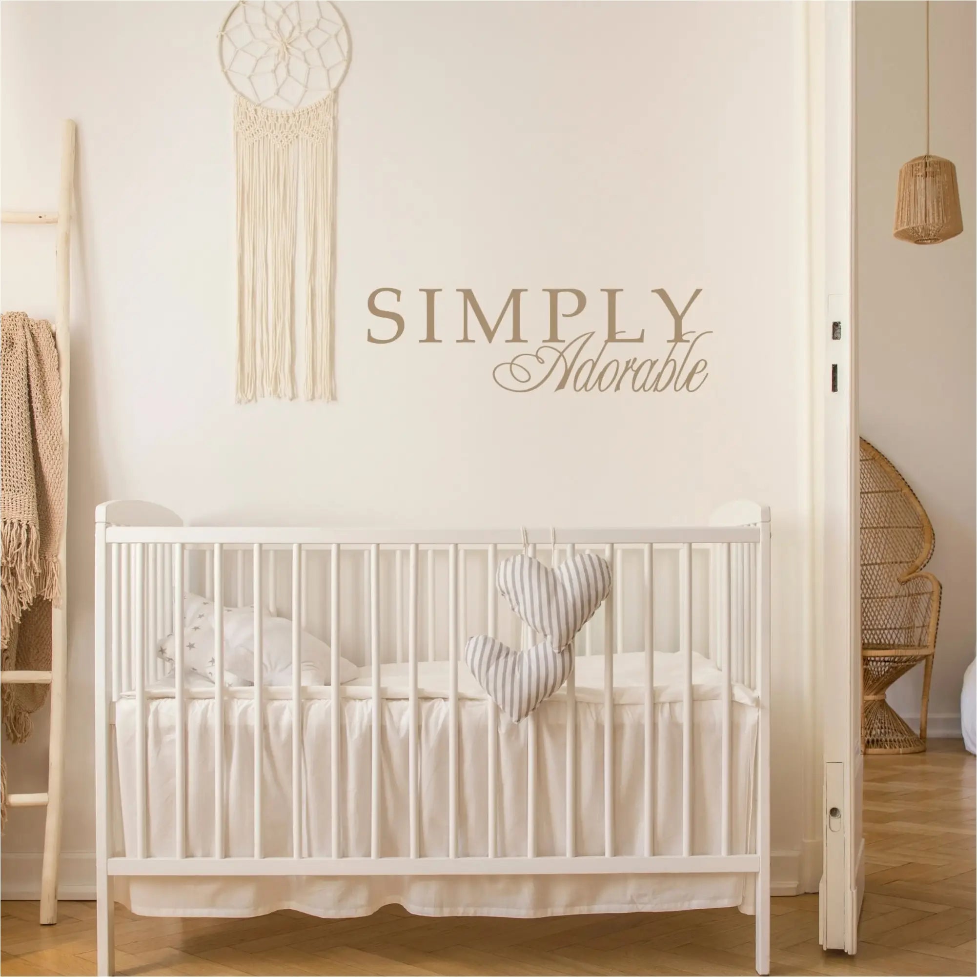 Simply Adorable vinyl wall decal over a beautiful bohemian style nursery in gold vinyl supplied by The Simple Stencil