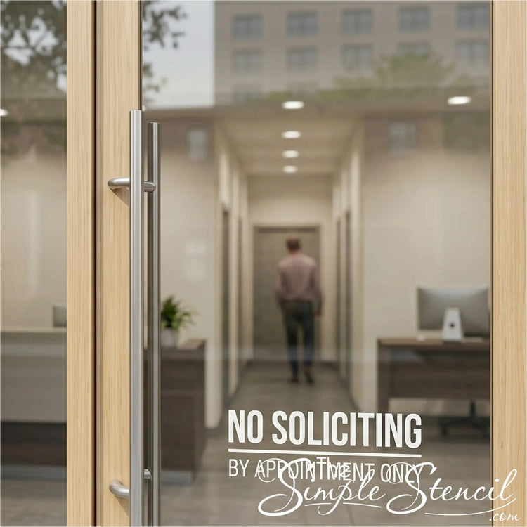 Glass door with 'No Soliciting, By Appointment Only' sign in an office setting
