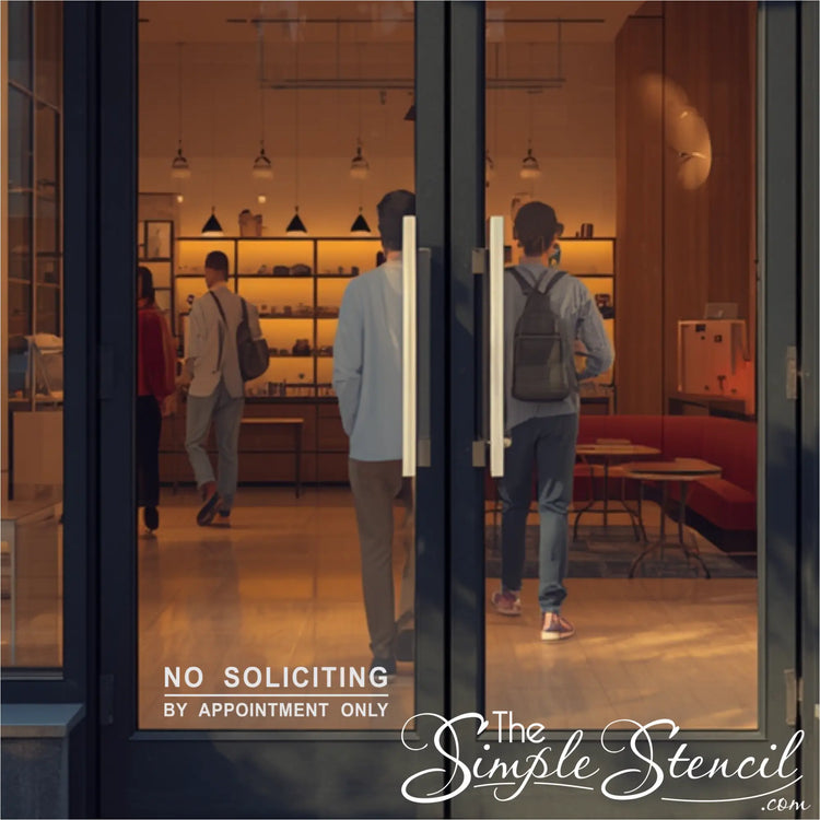 No Soliciting vinyl lettering applied to glass door of a retail store to discourage salesman. 