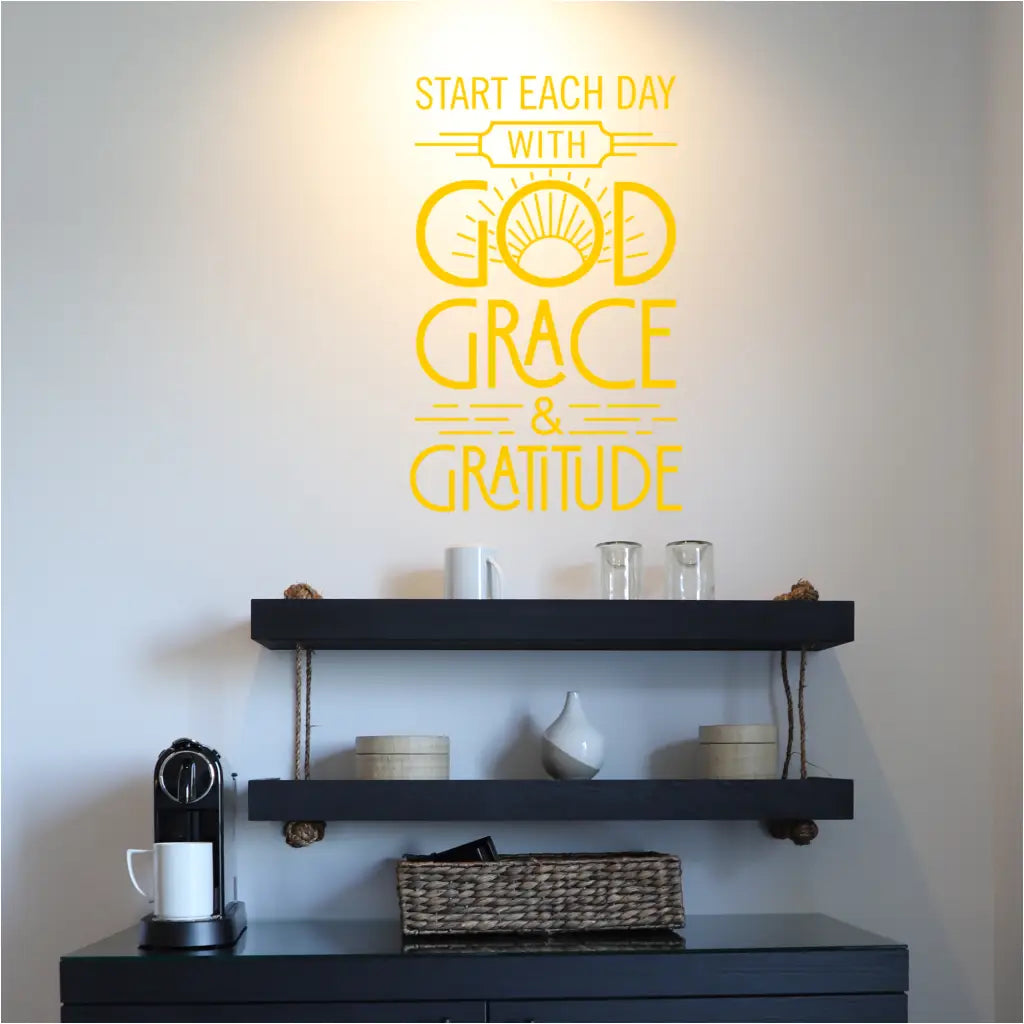 Decorative decal featuring the words "Start each day with God, Grace, and Gratitude"