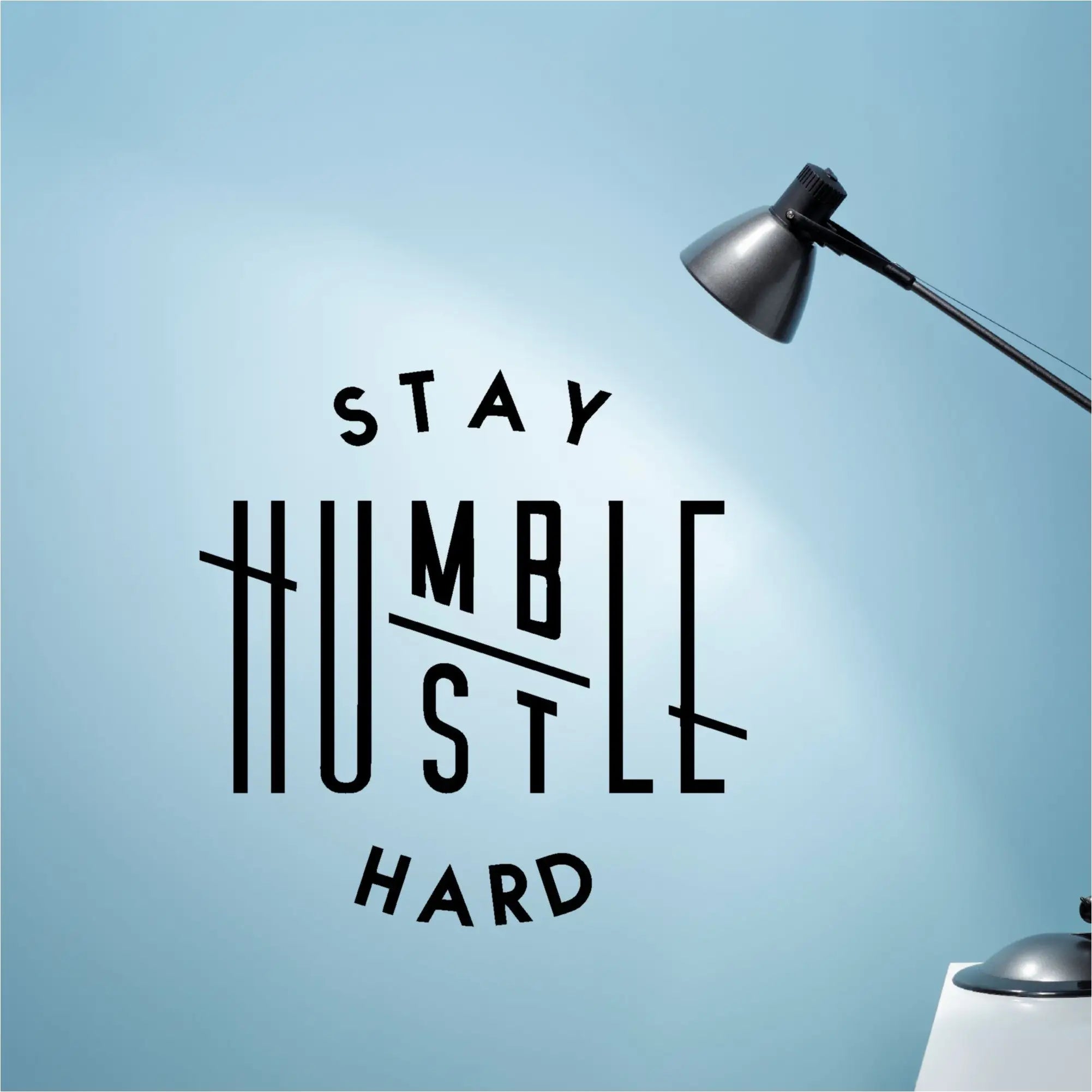 Stay Humble Hustle Hard - Black wall decal by The Simple Stencil installed on office or classroom wall. 