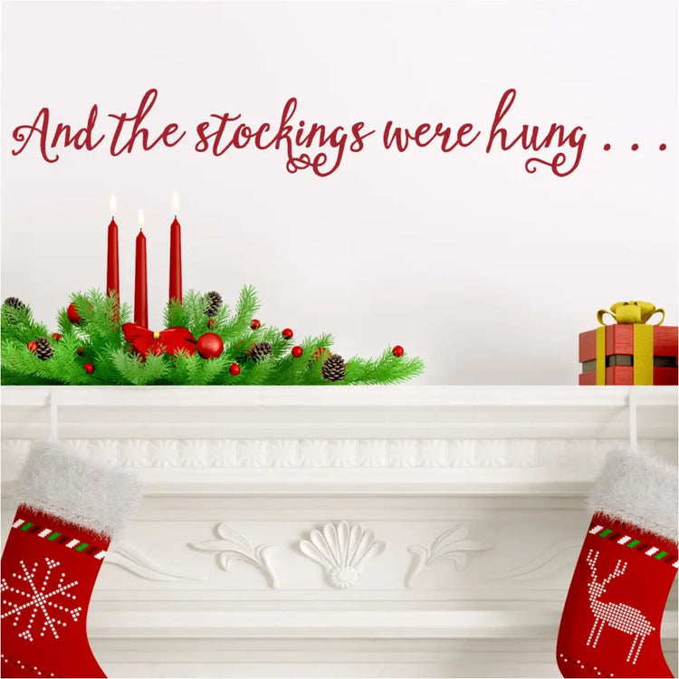 And the stockings were hung... An adorable scripted vinyl decal for the Christmas and Holiday decorating looks great over a mantle or wherever your family stockings are hung for santa. By The Simple Stencil Christmas Decor.