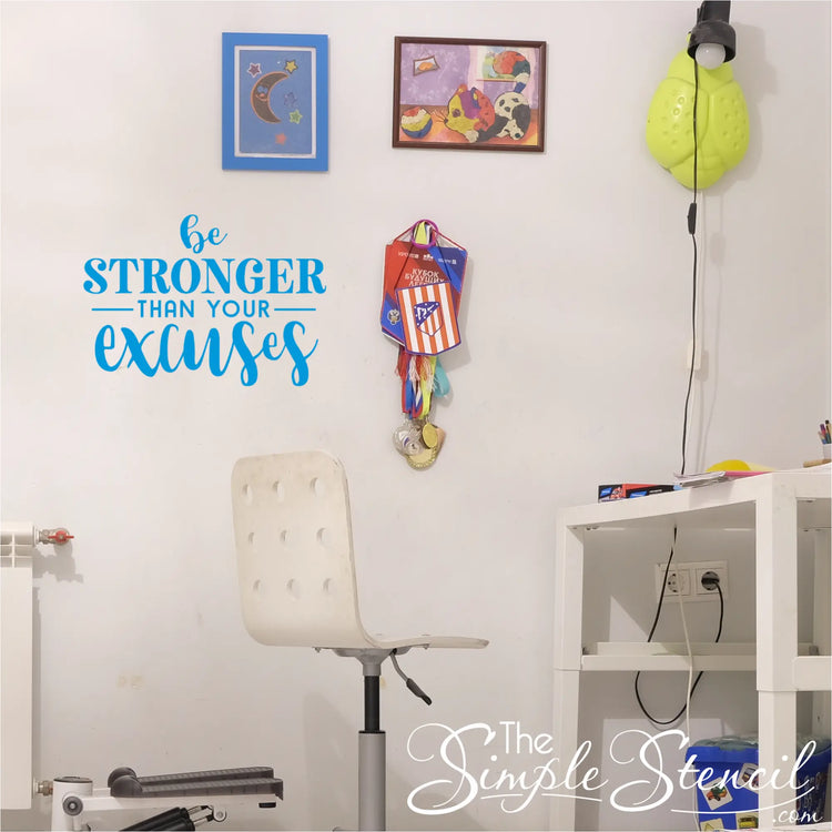 Motivational quote on a wall with a chair, desk, and teen room decor study area